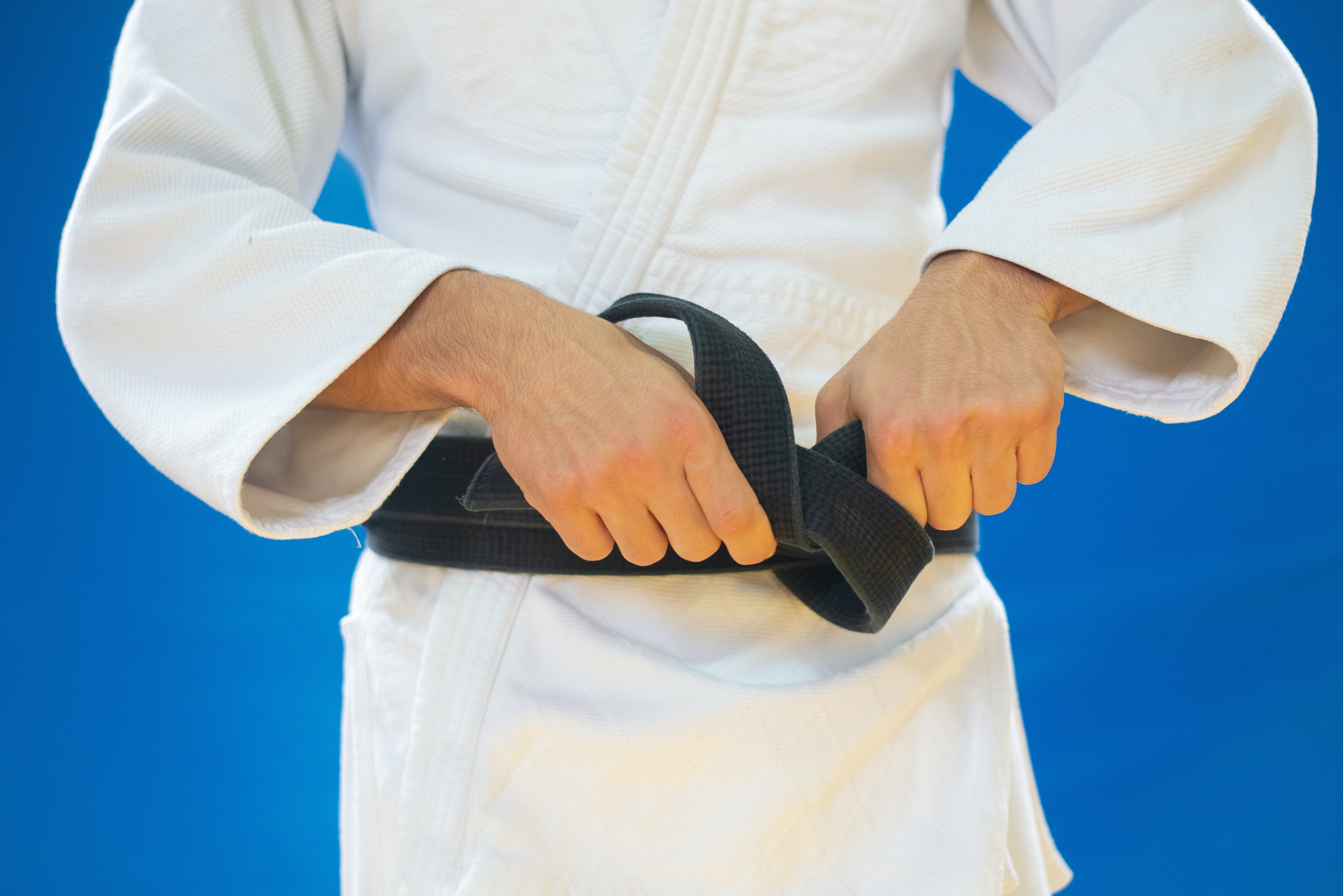 Comprendre le système de grades au judo : de la ceinture blanche à la ceinture noire